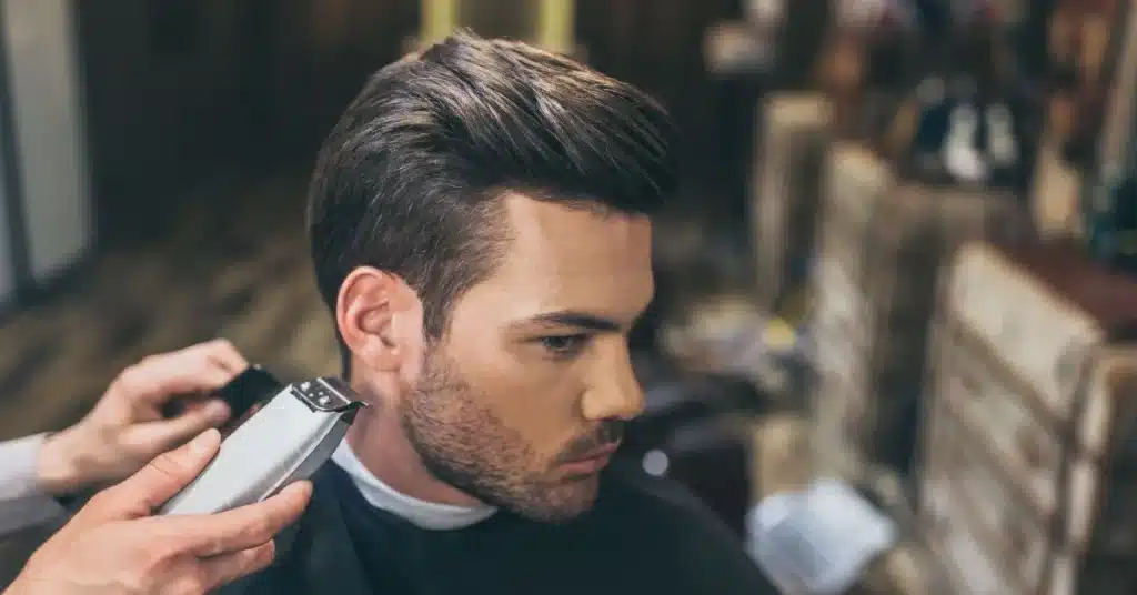 Comb-over with undercut hairstyle in men