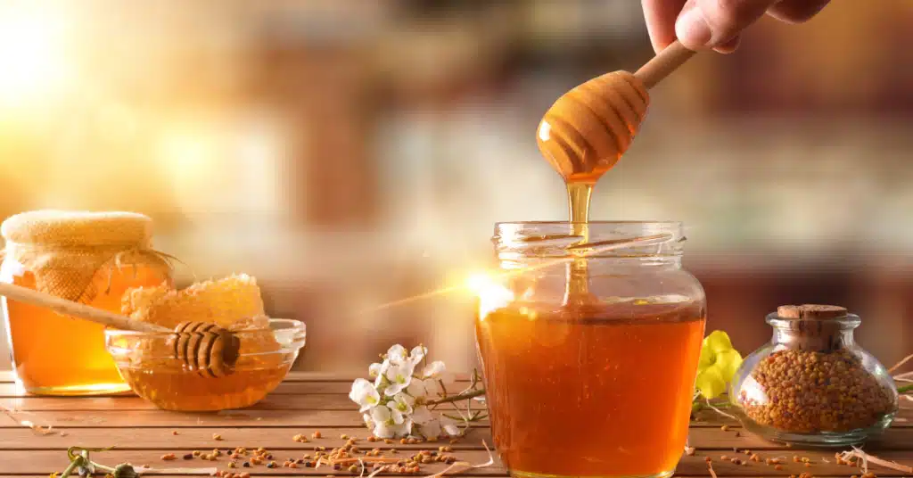 Image of a honey bottle used for sun damaged hair