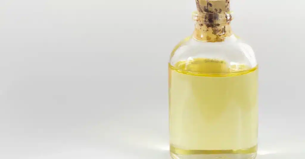 sealed jar with peppermint oil for hair