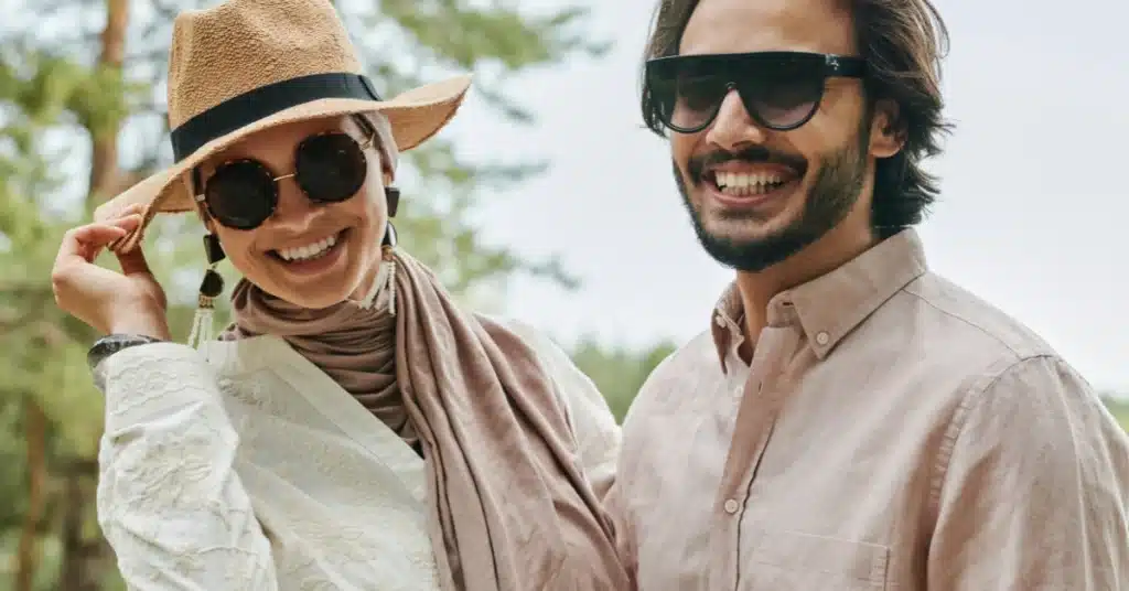 Couple wearing sunglasses to protect their eyes