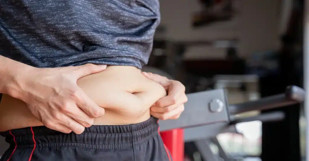 fat accumulation around the abdomen